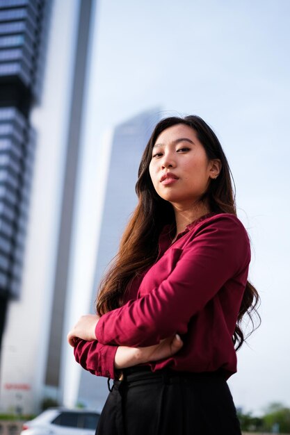 Portrait of empowered young woman in financial district