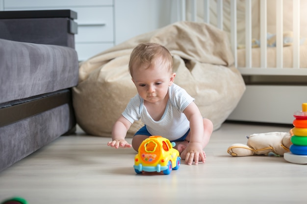 Photo portrait of energetic cute toddler