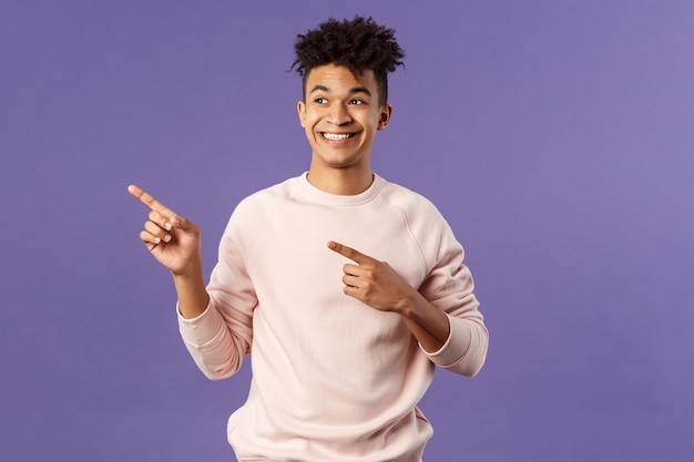 Portrait of enthusiastic, good-looking hispanic man with dreads