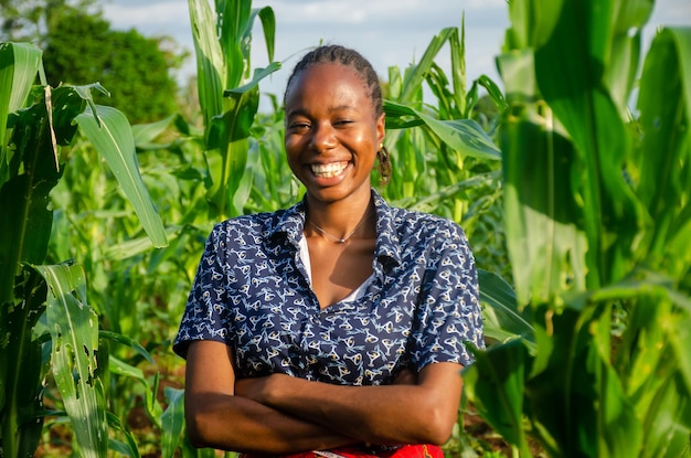 Portrait of an excited and happy female african farmer