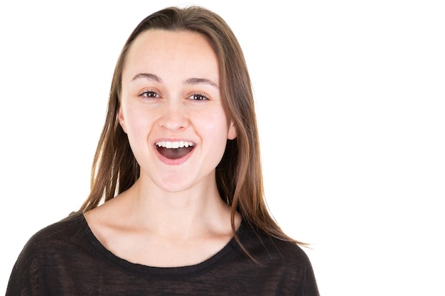 Portrait of an excited pretty young woman open mouth