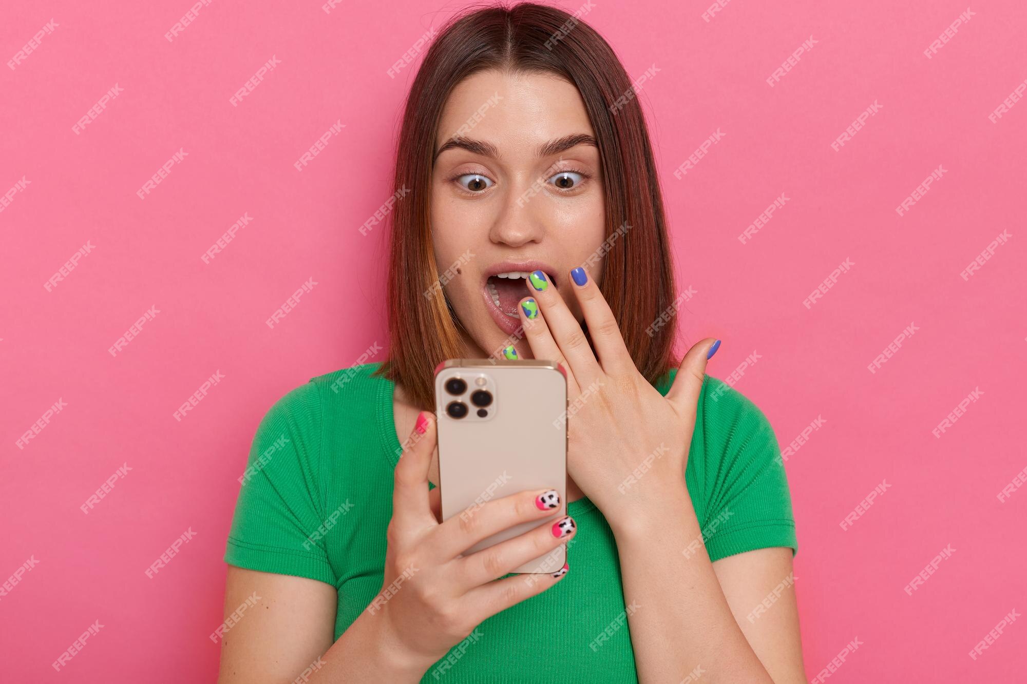 Premium Photo | Portrait of excited shocked surprised woman ...