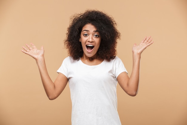 Portrait of an excited young african woman