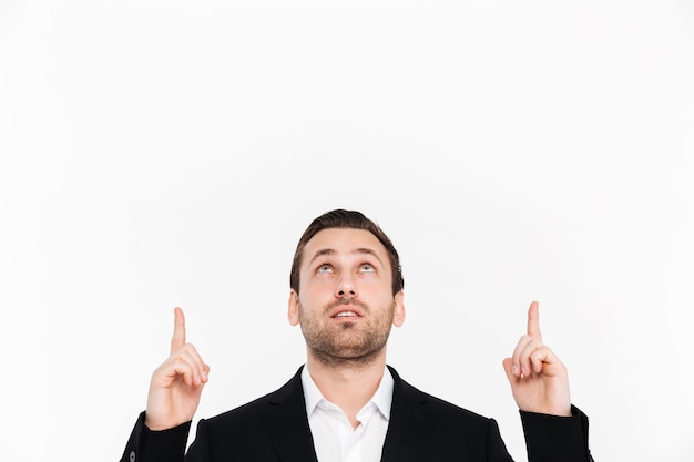 Portrait of an excited young businessman