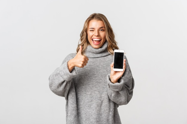 Portrait expressive young woman with mobile