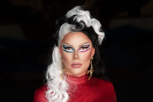 Portrait of fabulous drag queen with a black and white wig