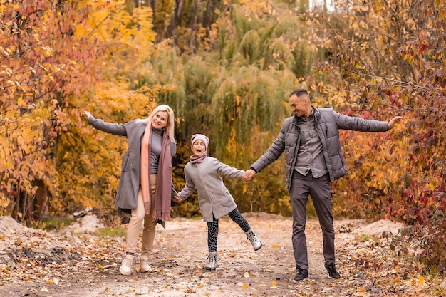 Portrait of family during the autumn