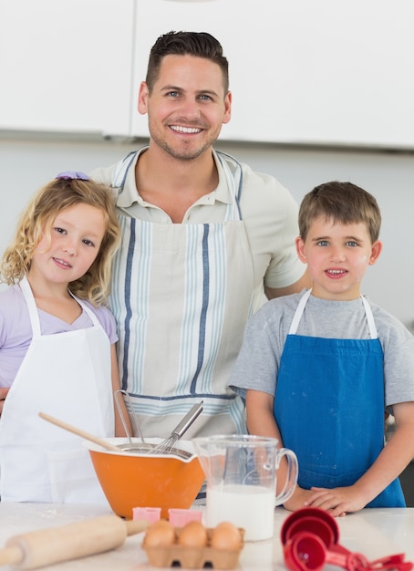 Portrait of family baking cookies