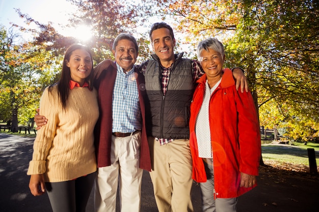 Portrait of family standing at park