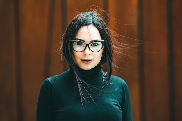 Portrait of fashion model woman wearing eye glasses