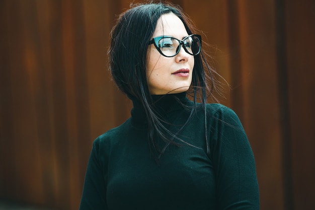 Portrait of fashion model woman wearing eye glasses