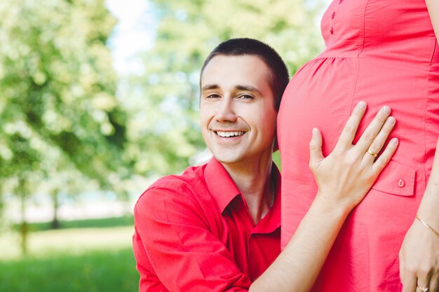 Portrait of father with pregnant wife