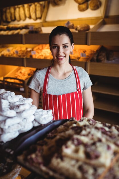 Portrait of female baker smiling