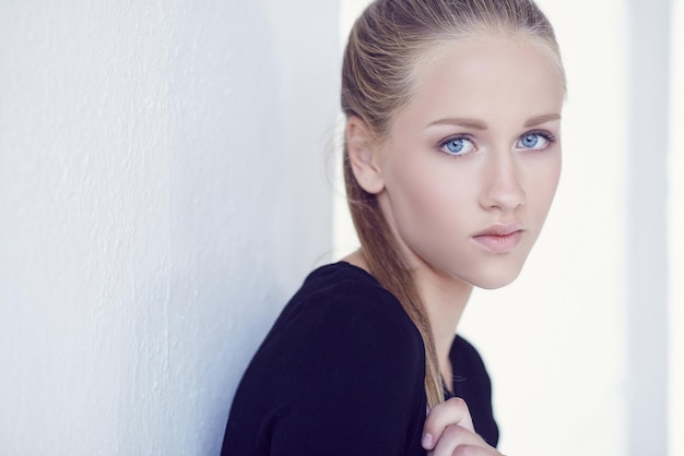 Portrait of a female in black shirt.