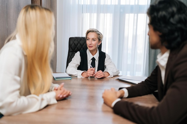 Portrait of female boss listening of businesswoman sharing opinion presenting business idea make