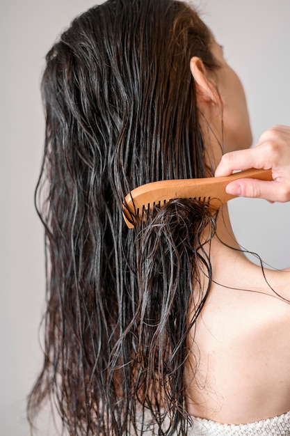 Portrait female comb hair