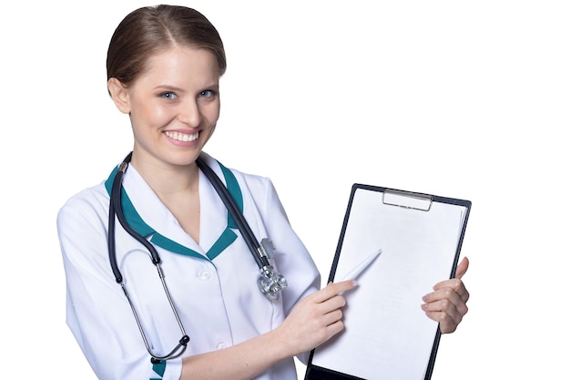 Portrait of female doctor posing on white background