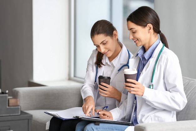 Portrait of female doctors in clinic