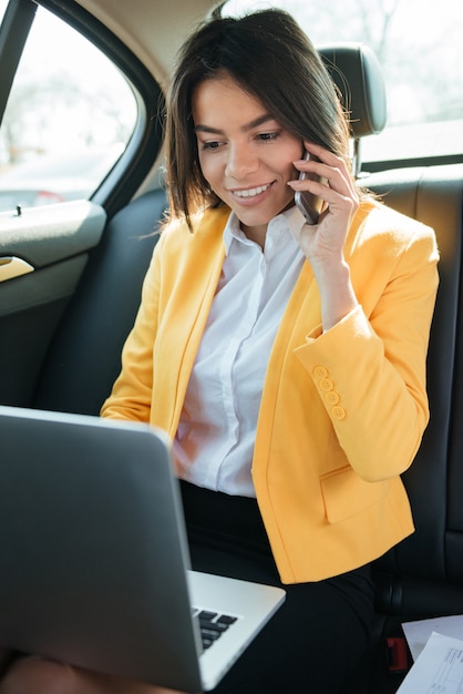 Portrait of a female entrepreneur talking on the phone