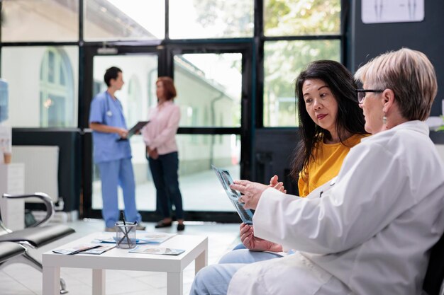 Portrait of female friends working in office