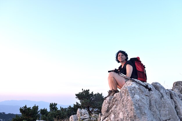 Portrait of a female hiker who has reached the top