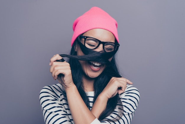 portrait female with pink hat