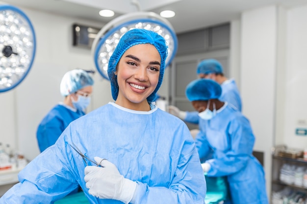 Portrait of female woman nurse surgeon dressed in surgical scrubs