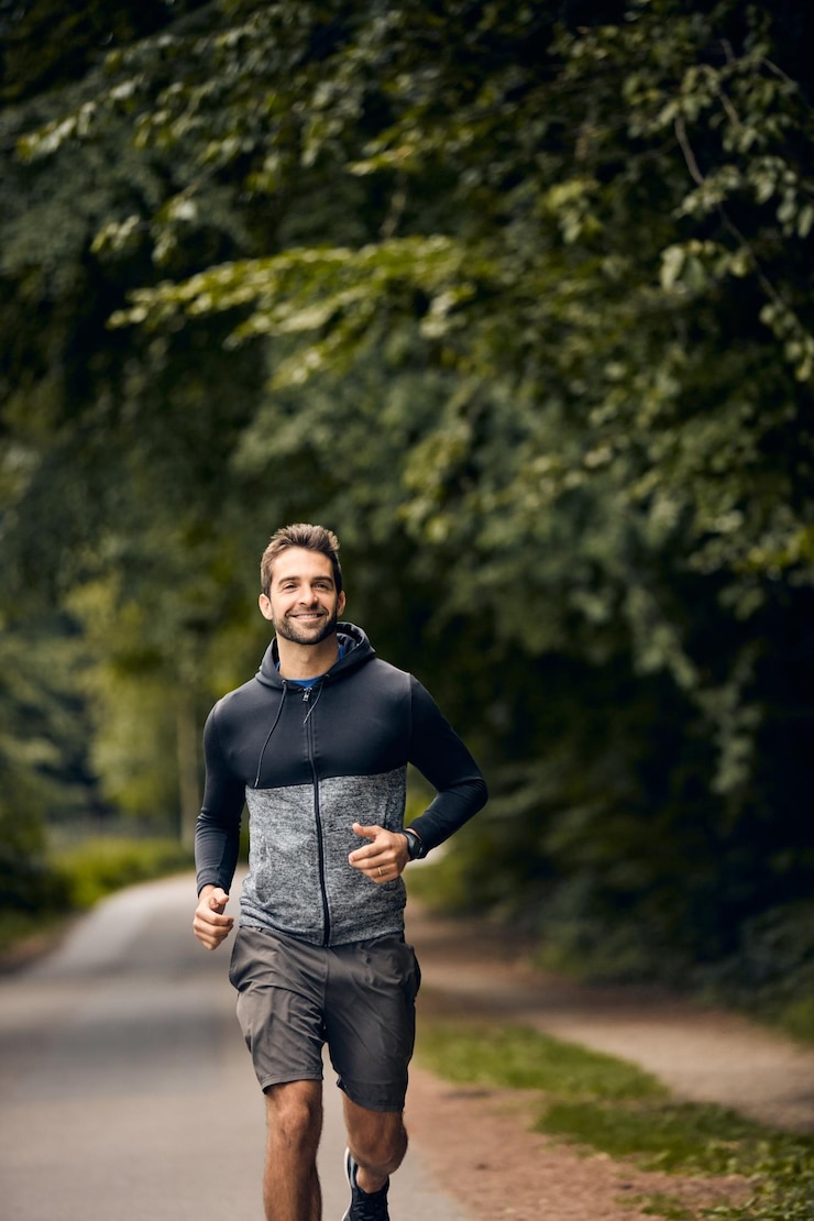 Photo portrait fitness and man in park for running challenge wellness and healthy outdoor exercise training cardio and runner on path in nature with commitment progress and athlete in muscle workout
