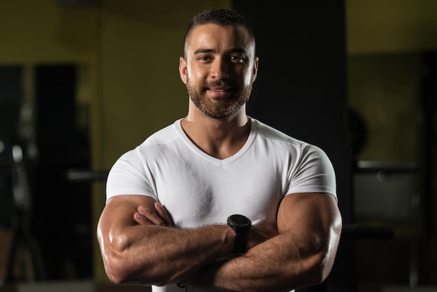 Portrait Of A Fitness Man In White Shirt