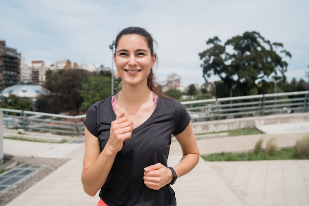 Portrait of fitness woman running