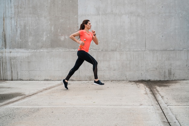 Portrait of fitness woman running