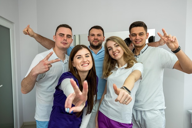 Portrait of five dentist at modern clinic Medical team Health care