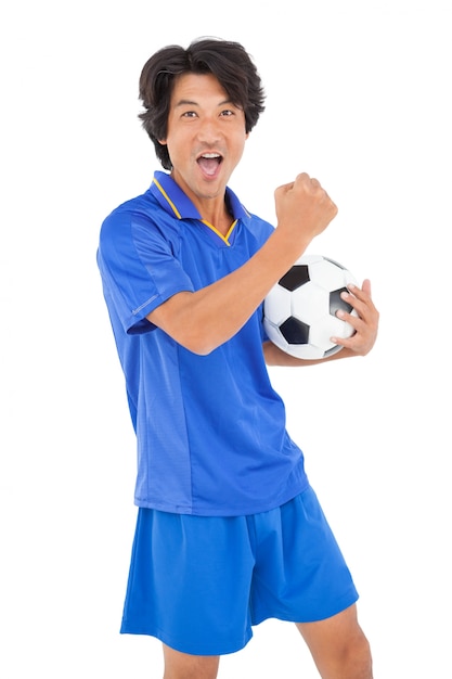 Portrait of a football player cheering