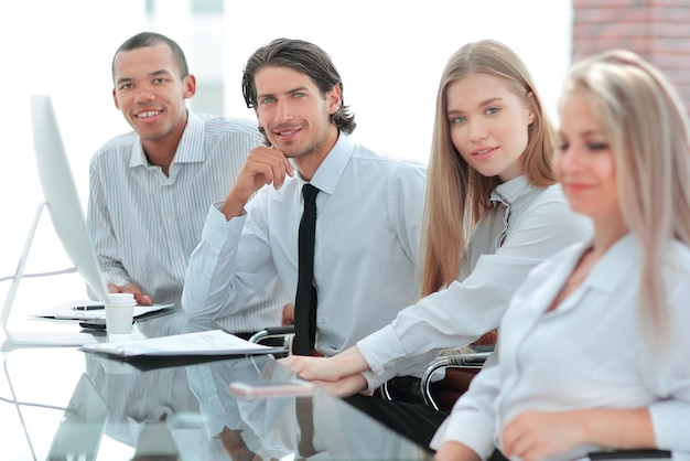 Portrait of friendly business team in office