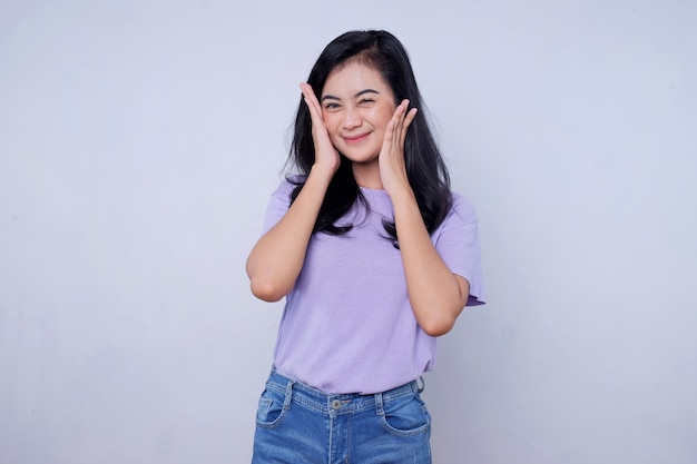 Portrait of friendly-looking charming outgoing female coworker with black hair raise palm and wave in greeting smiling pleasant on white wall