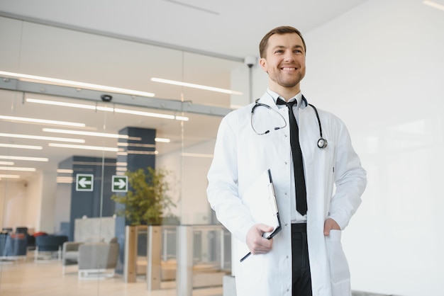 Portrait of friendly male doctor smiling