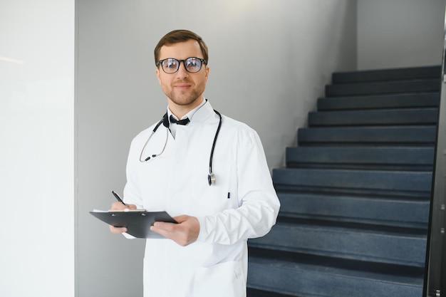 Portrait of friendly male doctor smiling