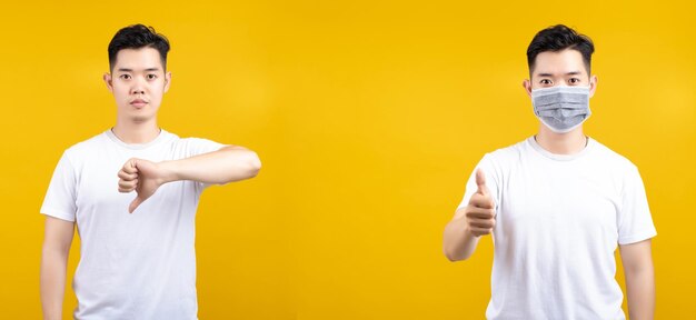 Portrait of friends standing against yellow background