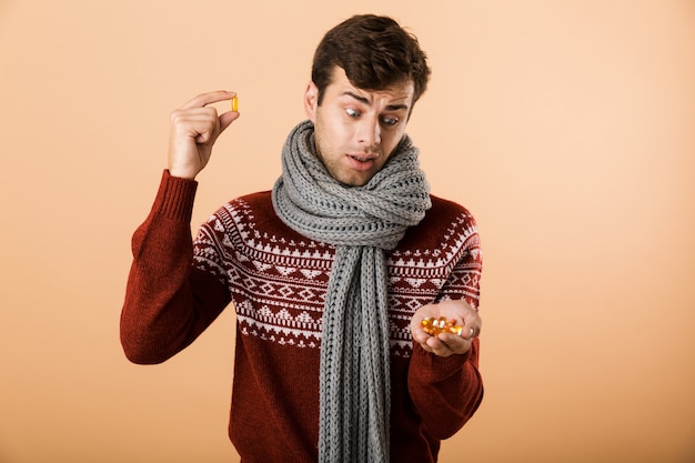 Portrait a frustrated man dressed in sweater