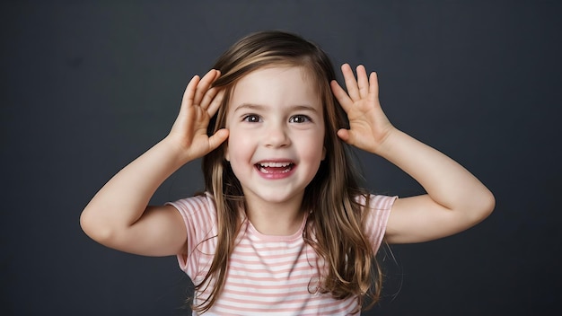 Portrait of funny little girl acting in studio shot