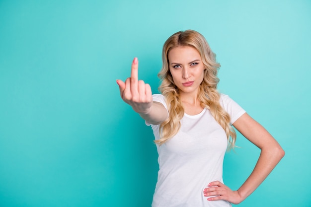 Portrait of furious lady show middle finger fuck bad sign