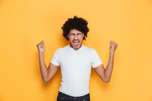 Portrait of a furious young african guy screaming