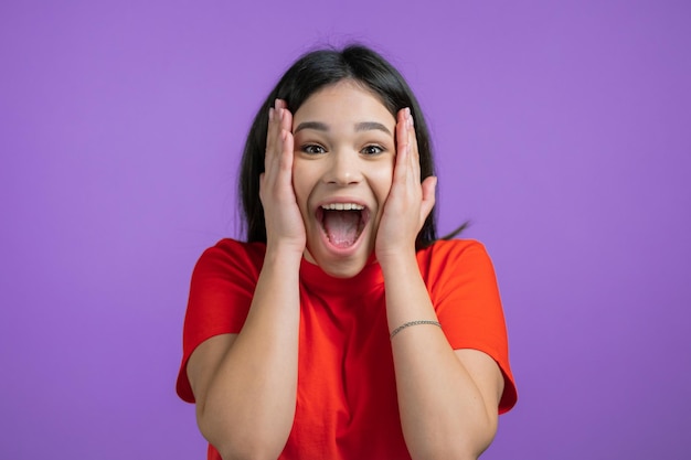 Portrait of a girl against colored background