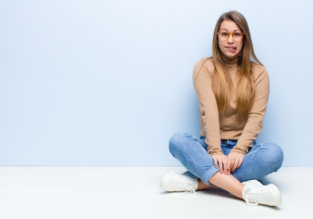 portrait of a girl on a blue background