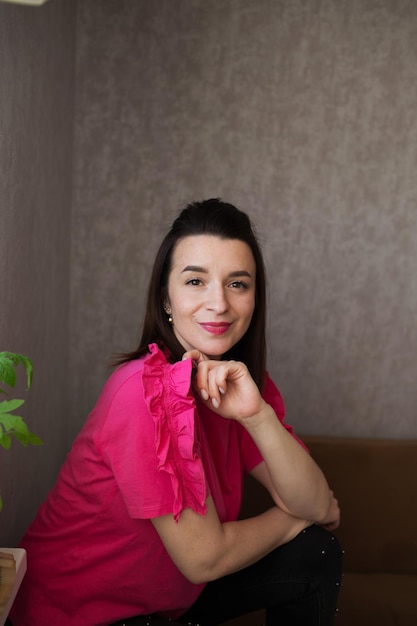 Portrait of a girl in a pink blouse