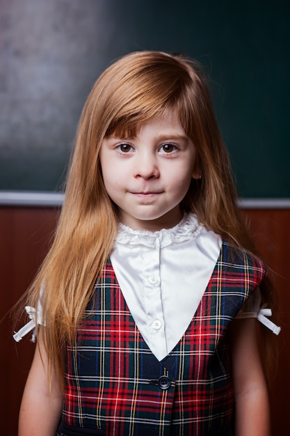 Portrait of a girl on a school board.