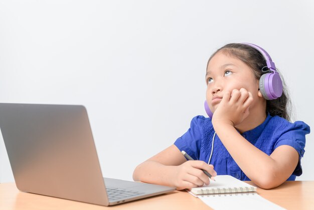 Portrait of a girl sitting at a desk