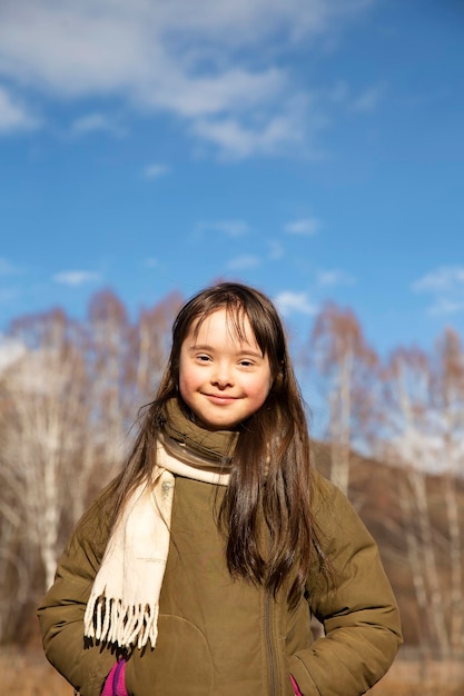 Portrait of the girl smiling in the country