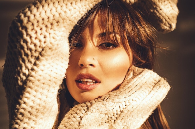 Portrait of a girl at sunset in cinematic light