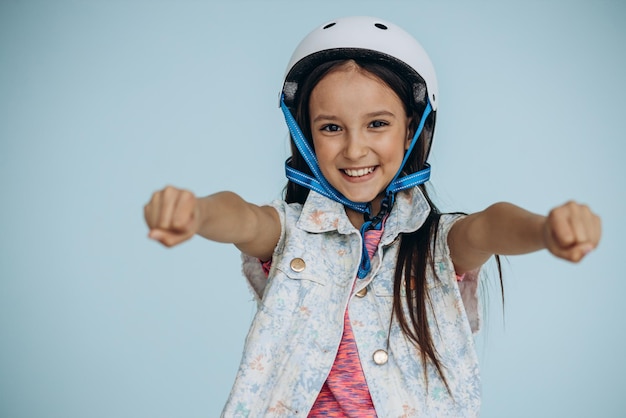 Portrait of a girl wearing scooter helmet
